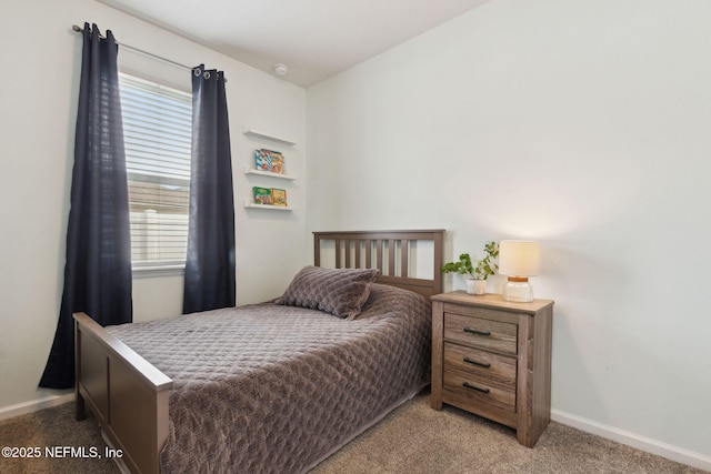 bedroom with light colored carpet