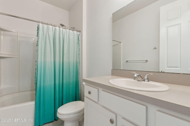 full bathroom featuring vanity, toilet, and shower / tub combo