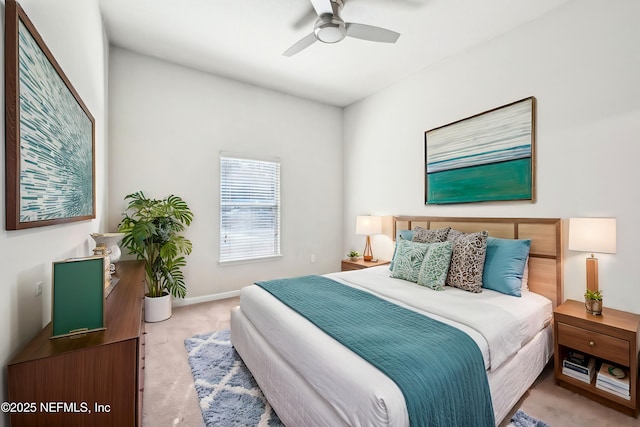 bedroom featuring carpet, baseboards, and ceiling fan