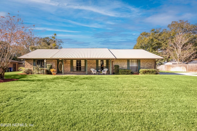 ranch-style house with a front yard