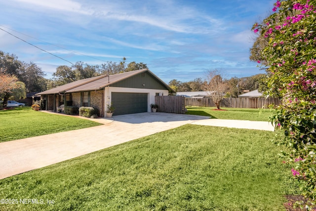 view of side of home featuring a lawn and a garage