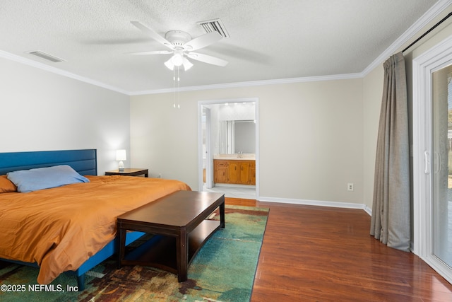 bedroom with a textured ceiling, ceiling fan, ornamental molding, and ensuite bathroom