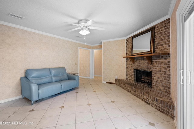 tiled living room featuring ceiling fan, a fireplace, a textured ceiling, and ornamental molding