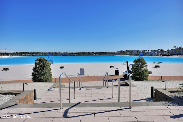 view of water feature featuring a beach view