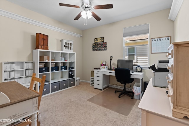 office with light carpet and ceiling fan