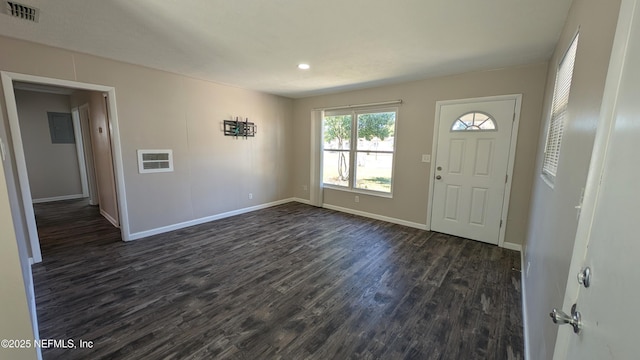 foyer entrance featuring dark hardwood / wood-style flooring