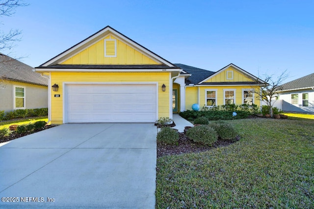 ranch-style home featuring a front yard and a garage