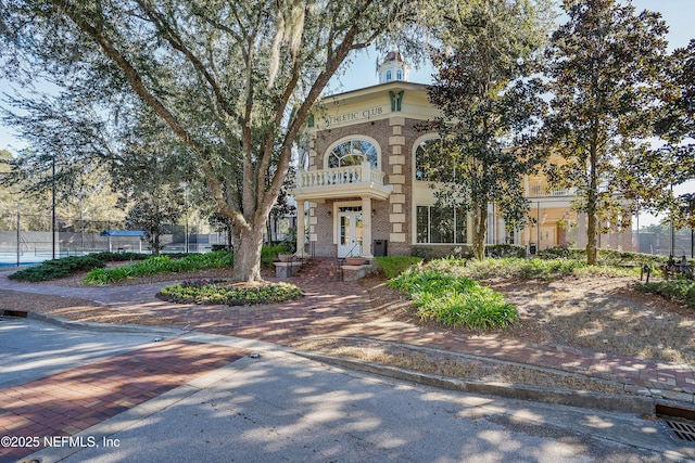 italianate-style house featuring central air condition unit