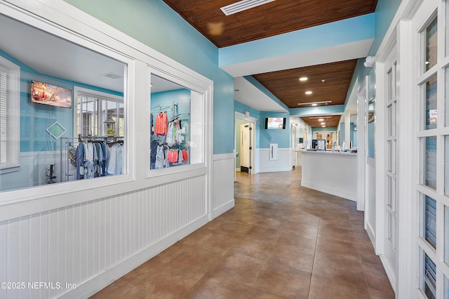 hall featuring wooden ceiling