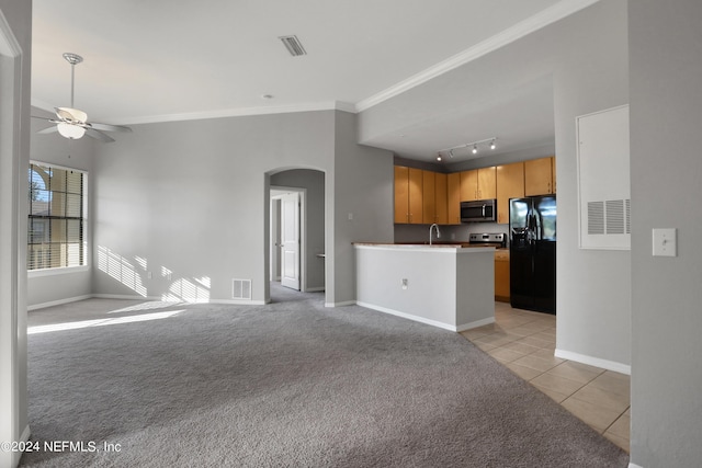 kitchen featuring appliances with stainless steel finishes, crown molding, kitchen peninsula, ceiling fan, and light tile patterned flooring