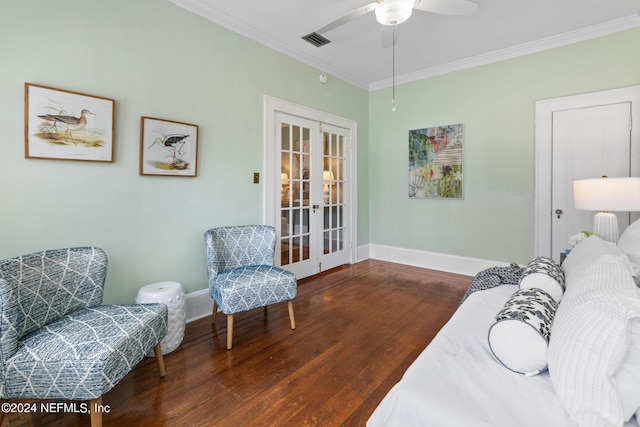 living area with dark hardwood / wood-style floors, ceiling fan, crown molding, and french doors