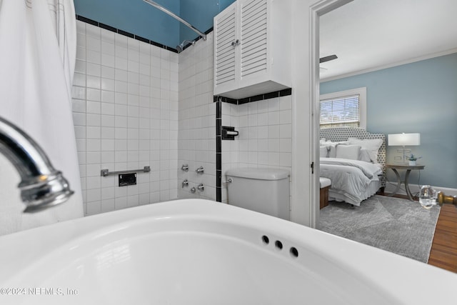 bathroom featuring shower / bathtub combination with curtain