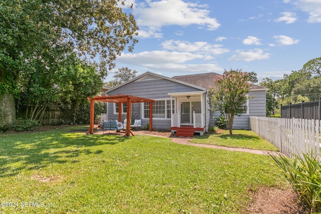 view of front of house with a pergola and a front yard