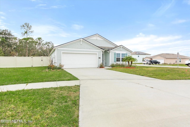 ranch-style house with a garage and a front yard