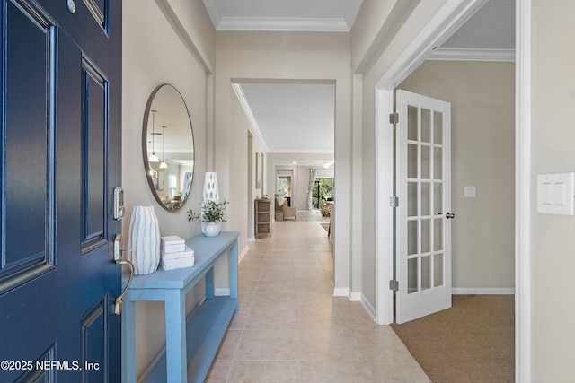 tiled foyer with crown molding