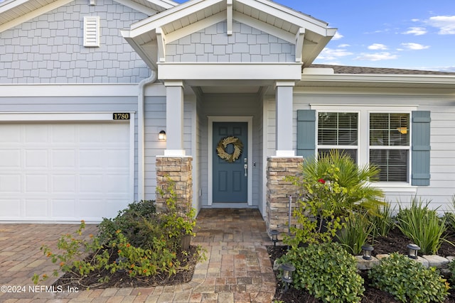 entrance to property with a garage