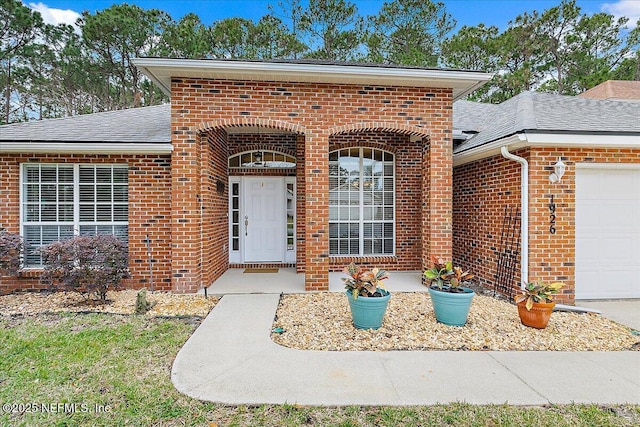 entrance to property with a garage