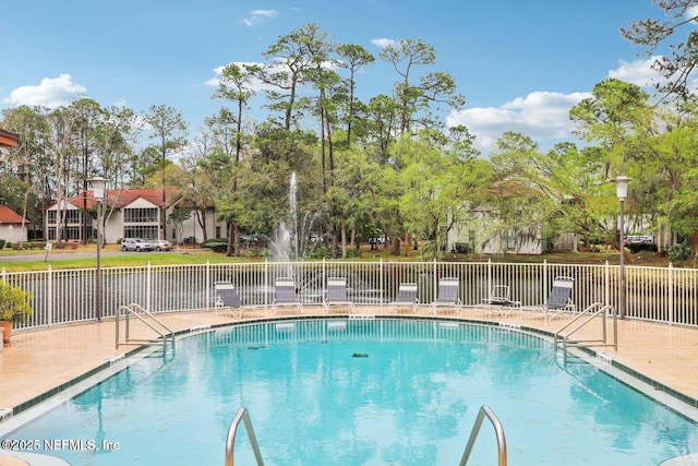 pool featuring fence