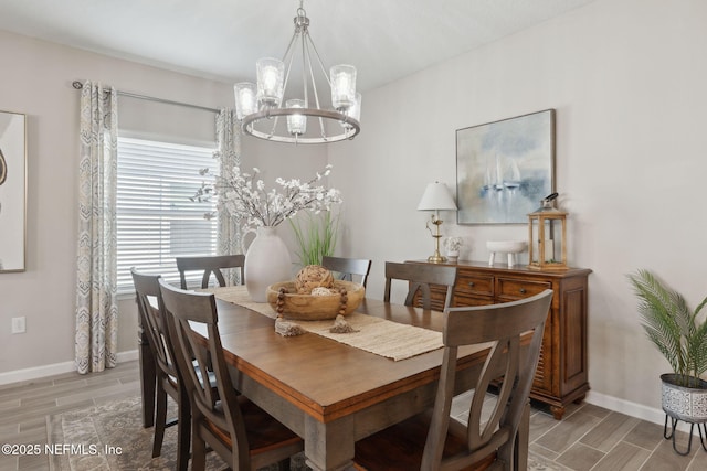 dining space with a chandelier