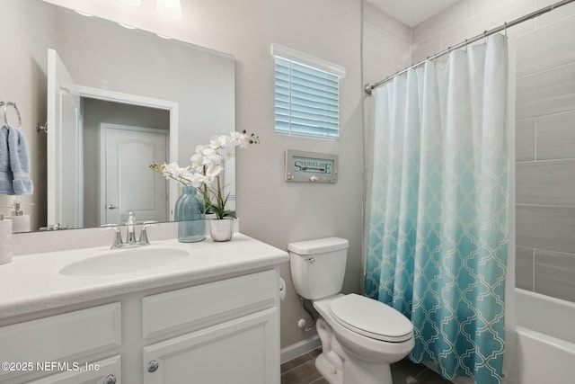 full bathroom featuring vanity, toilet, and shower / bath combo with shower curtain