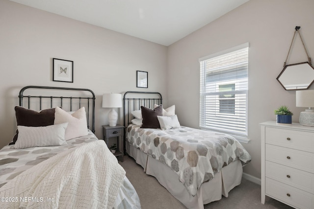 bedroom with light carpet