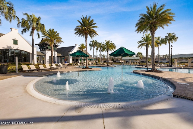 view of swimming pool featuring pool water feature