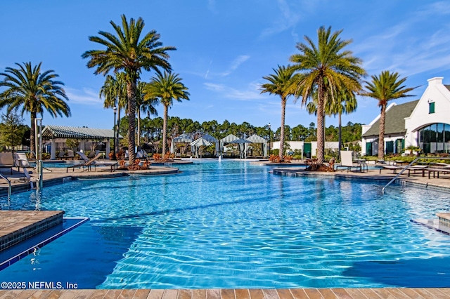 view of swimming pool featuring a patio area