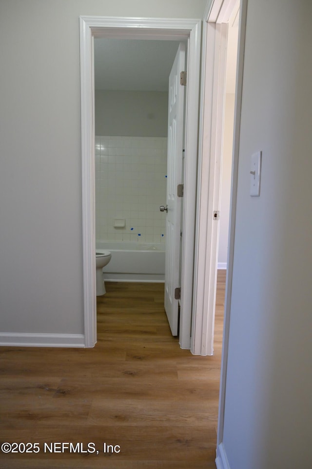 hallway featuring light wood-type flooring