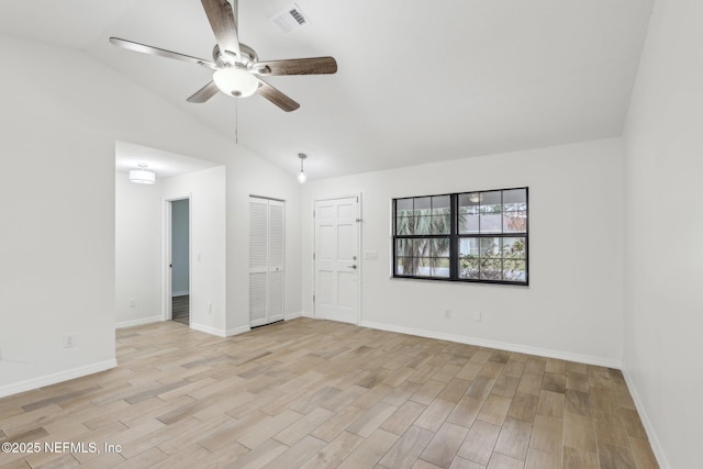 unfurnished room with vaulted ceiling and ceiling fan