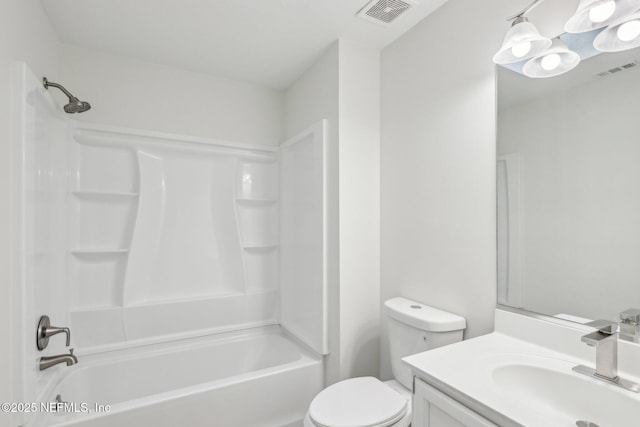 full bathroom featuring vanity, toilet, and bathtub / shower combination