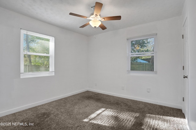 carpeted empty room with ceiling fan