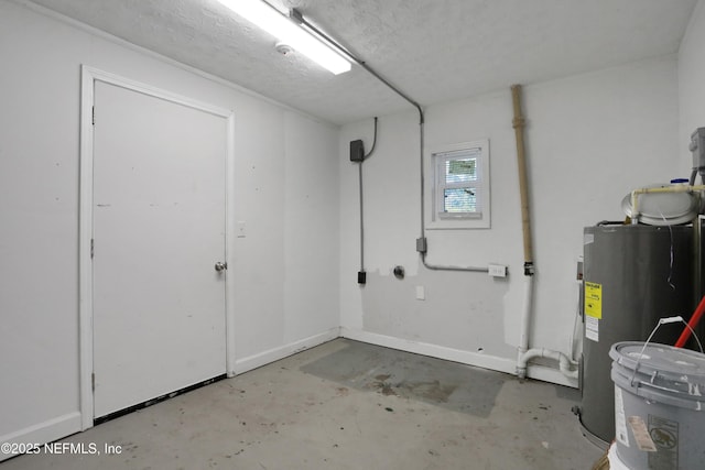 basement with a textured ceiling and electric water heater