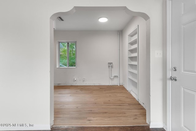 interior space with hardwood / wood-style floors