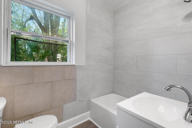 bathroom with toilet and sink