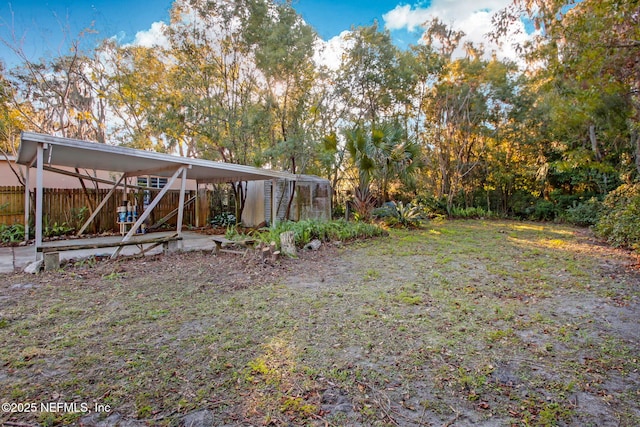 view of yard with a carport