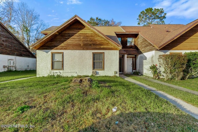 view of front of home with a front lawn