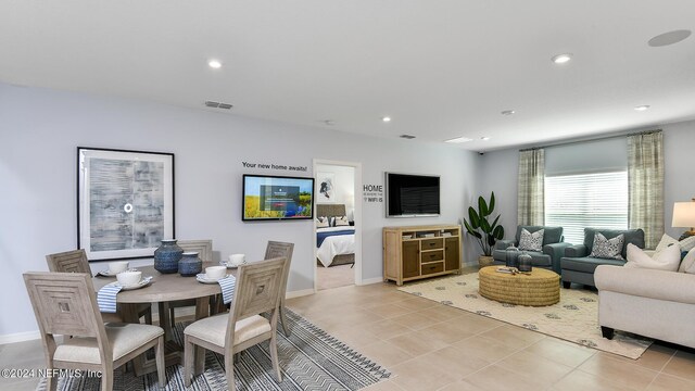 living room featuring light tile patterned floors