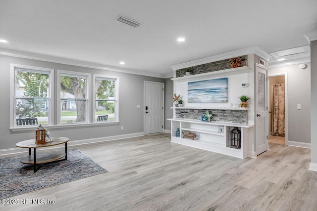 living room featuring light hardwood / wood-style flooring and crown molding