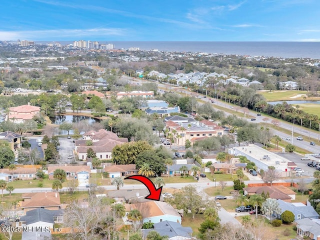 drone / aerial view with a water view