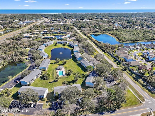 drone / aerial view with a water view