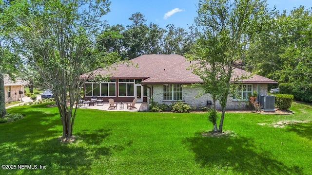 1814 Royal Fern Ln, Fleming Island, FL 32003 - back of house featuring a patio area, central AC unit, a yard, and a shingled roof
