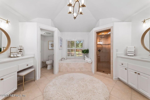 1814 Royal Fern Ln, Fleming Island, FL 32003 - bathroom with tile patterned floors, toilet, a stall shower, vaulted ceiling, and vanity