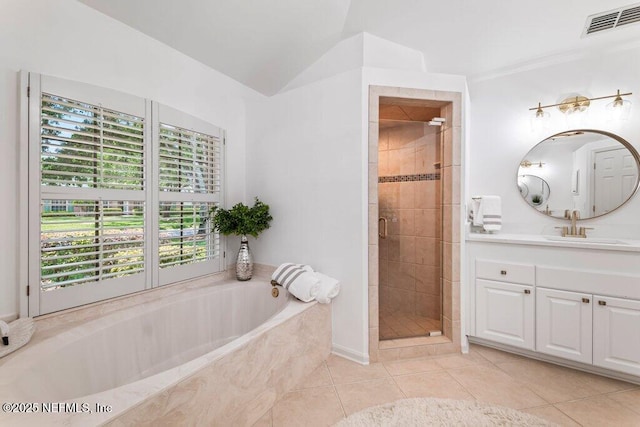 1814 Royal Fern Ln, Fleming Island, FL 32003 - full bath featuring tile patterned flooring, a shower stall, a bath, and vanity