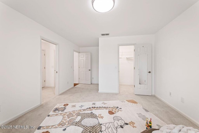 1814 Royal Fern Ln, Fleming Island, FL 32003 - bedroom featuring carpet floors, baseboards, and a spacious closet