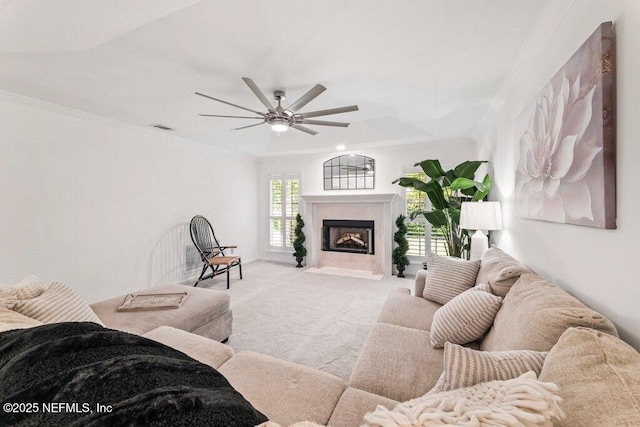 1814 Royal Fern Ln, Fleming Island, FL 32003 - living area featuring carpet floors, a ceiling fan, crown molding, and a premium fireplace