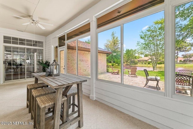 1814 Royal Fern Ln, Fleming Island, FL 32003 - sunroom / solarium with a ceiling fan, healthy amount of natural light, and a water view