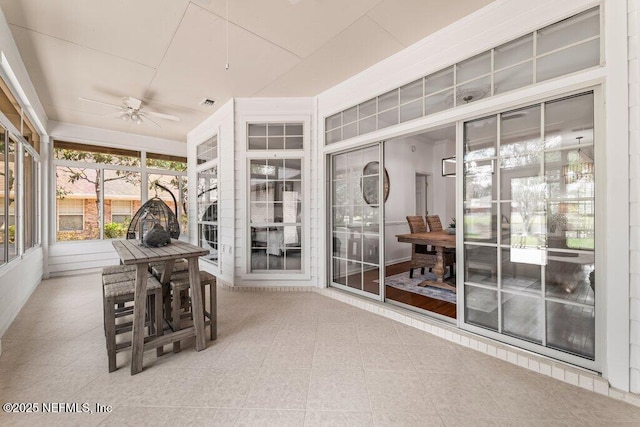 1814 Royal Fern Ln, Fleming Island, FL 32003 - sunroom featuring a ceiling fan and healthy amount of natural light