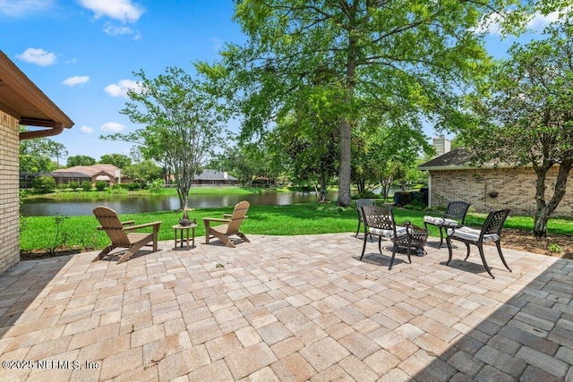 1814 Royal Fern Ln, Fleming Island, FL 32003 - view of patio with a water view and a fire pit