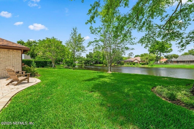 1814 Royal Fern Ln, Fleming Island, FL 32003 - view of grassy yard featuring a water view and a patio