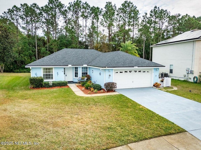 single story home with central AC, a front lawn, and a garage